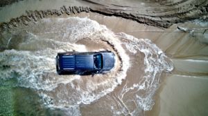 Car driving through water