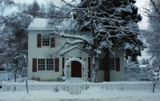 Winter Flood Risk: House in Winter Storm