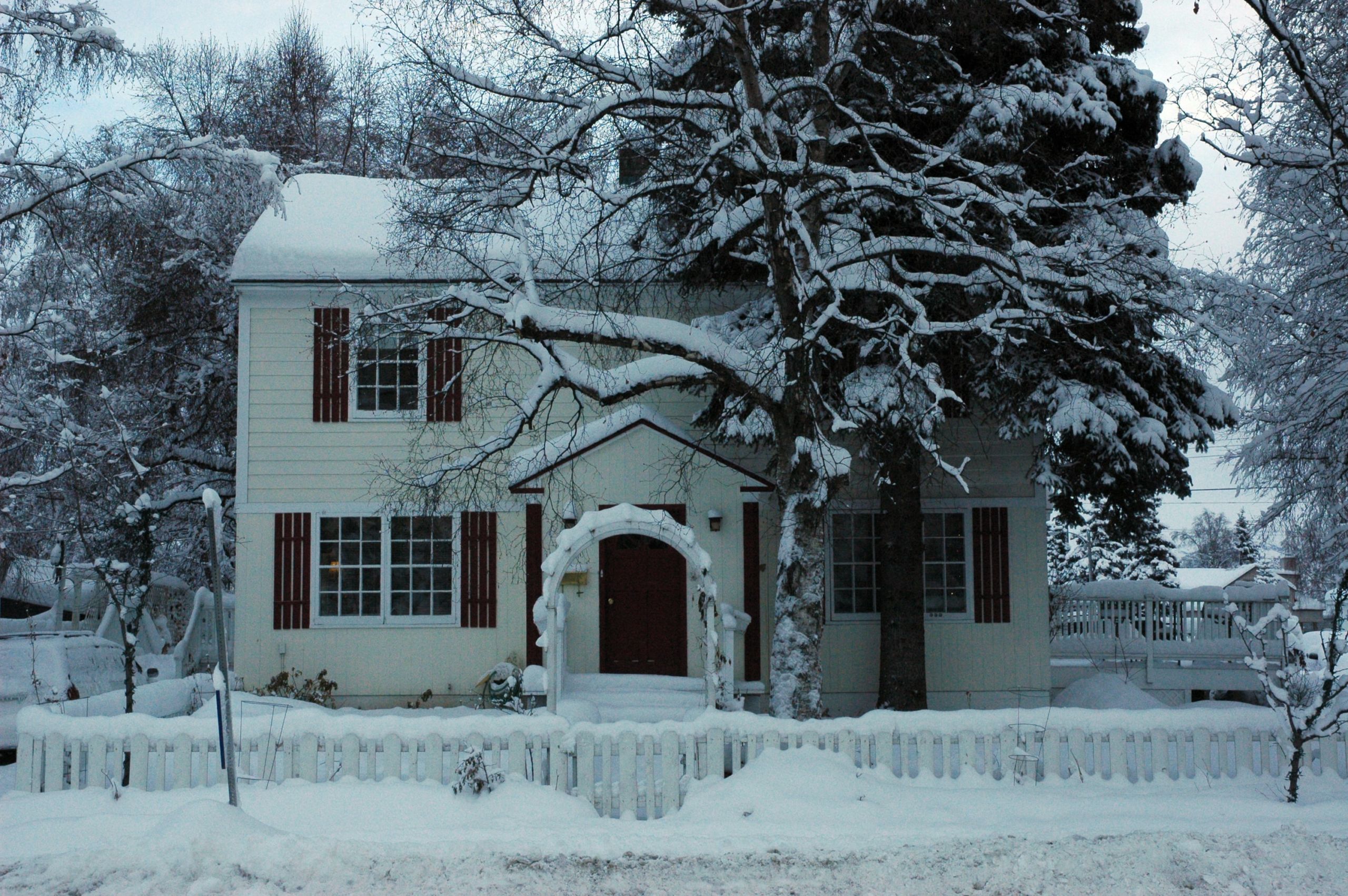 Winter Flood Risk: House in Winter Storm