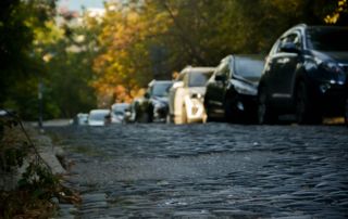Economic Impact of flooding flooded street with cars